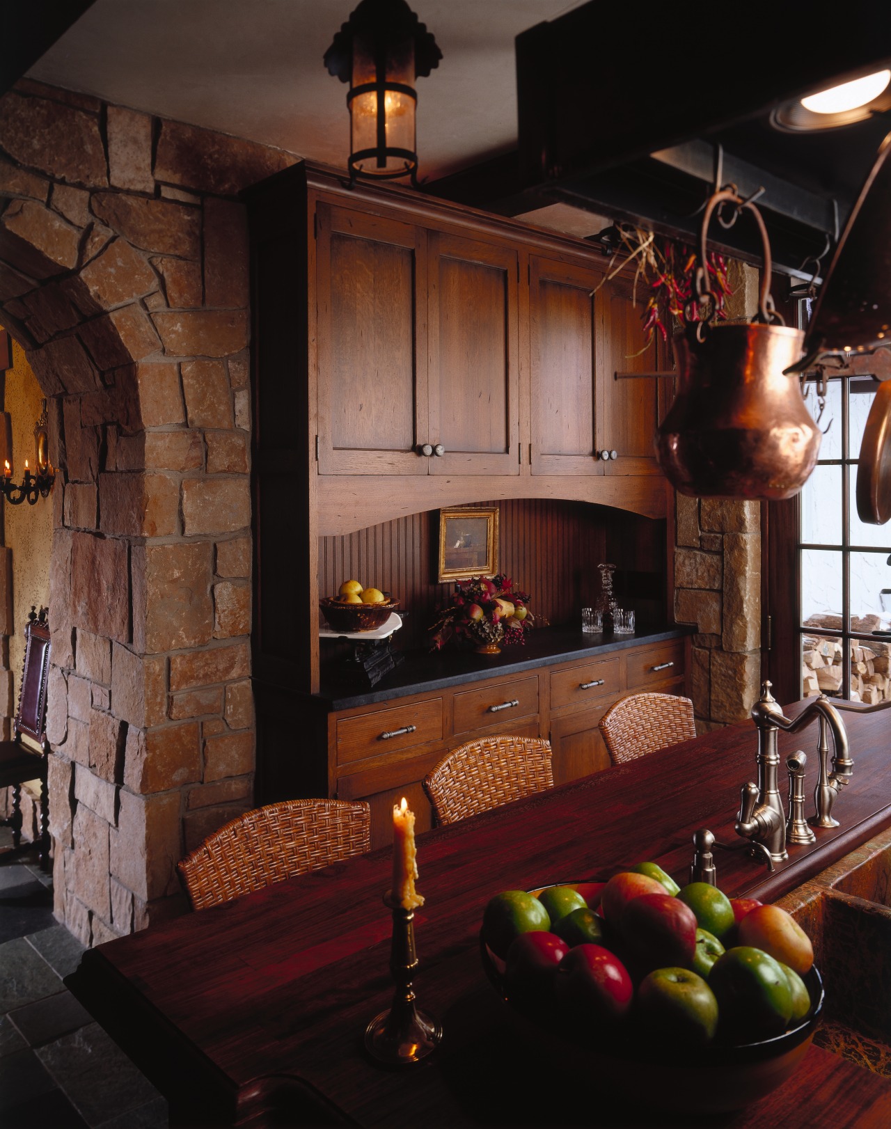 view of the dining area featuring oak table, fireplace, furniture, hearth, home, interior design, lighting, living room, room, black