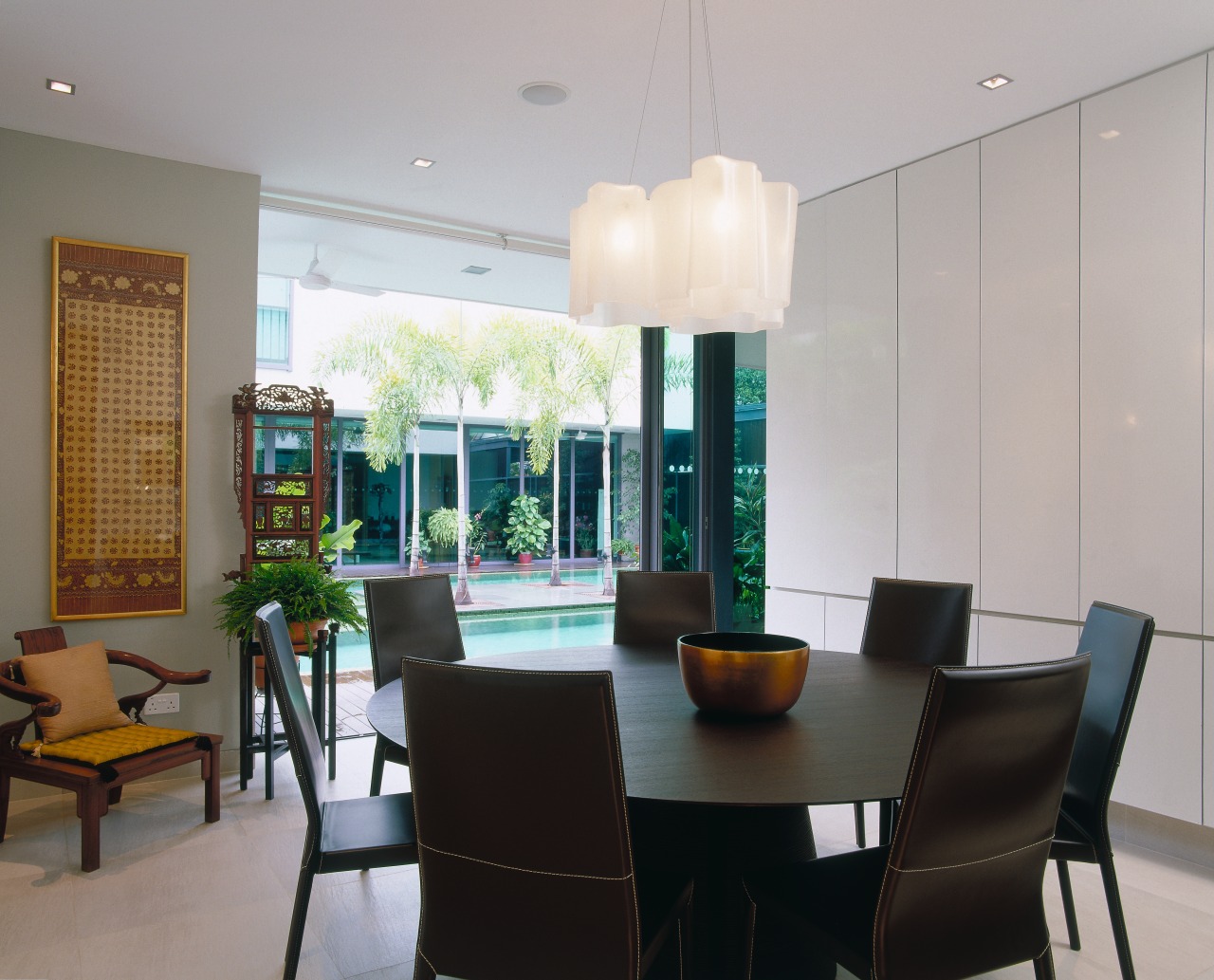 view of the dining area featuring dark stained ceiling, dining room, interior design, property, real estate, room, table, window, gray