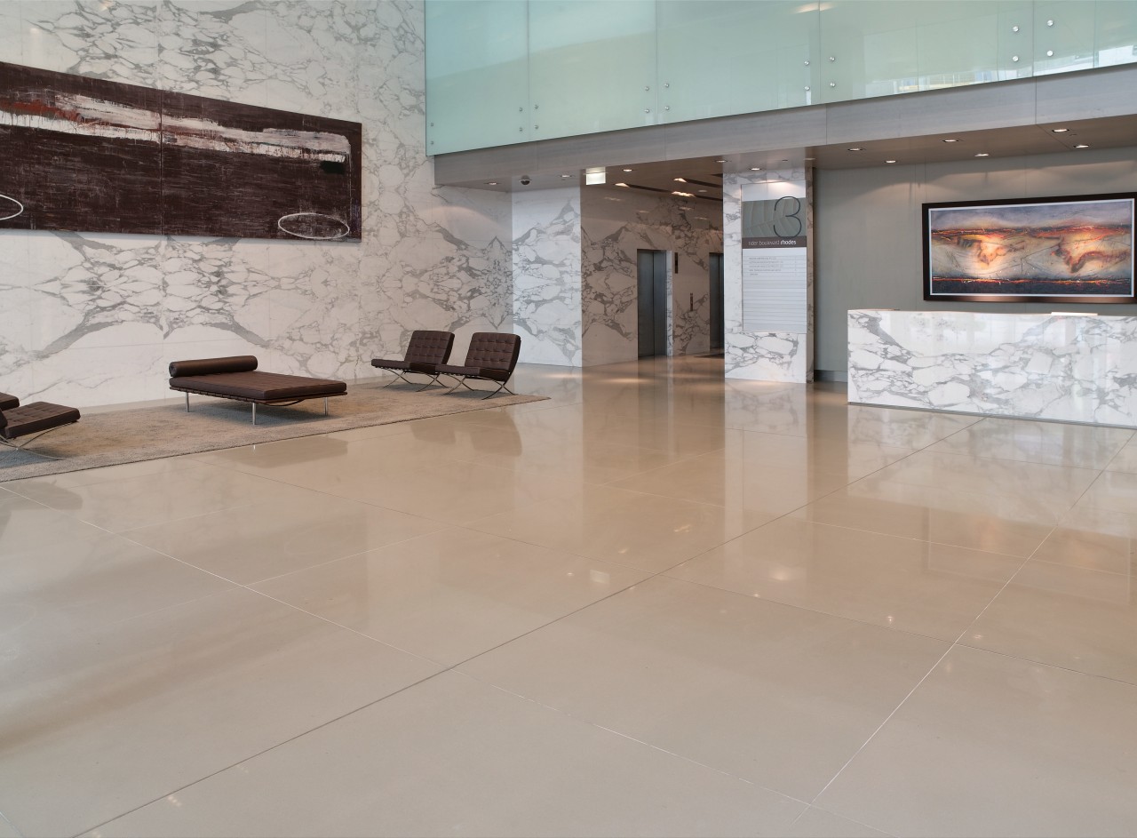 Large office foyer with natural marble cladding and floor, flooring, interior design, lobby, property, tile, wood flooring, gray