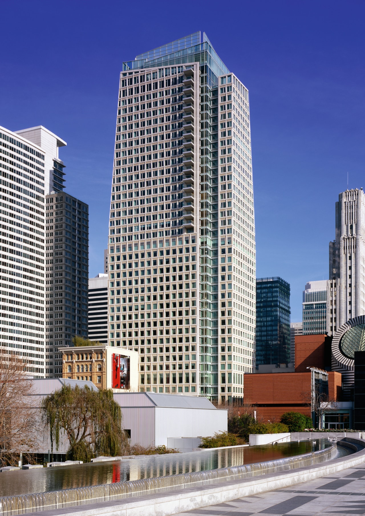 view of the st regis apartment building apartment, architecture, building, city, cityscape, commercial building, condominium, corporate headquarters, daytime, downtown, facade, headquarters, landmark, metropolis, metropolitan area, mixed use, neighbourhood, real estate, residential area, sky, skyline, skyscraper, tower, tower block, urban area, blue, gray