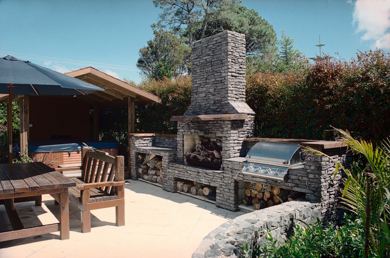 A view of some stone building material. backyard, landscape, outdoor structure, patio, real estate, black