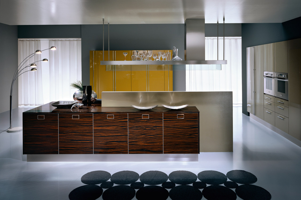 A view of a Pedini kitchen with brown cabinetry, countertop, cuisine classique, floor, flooring, interior design, kitchen, product design, room, gray, black