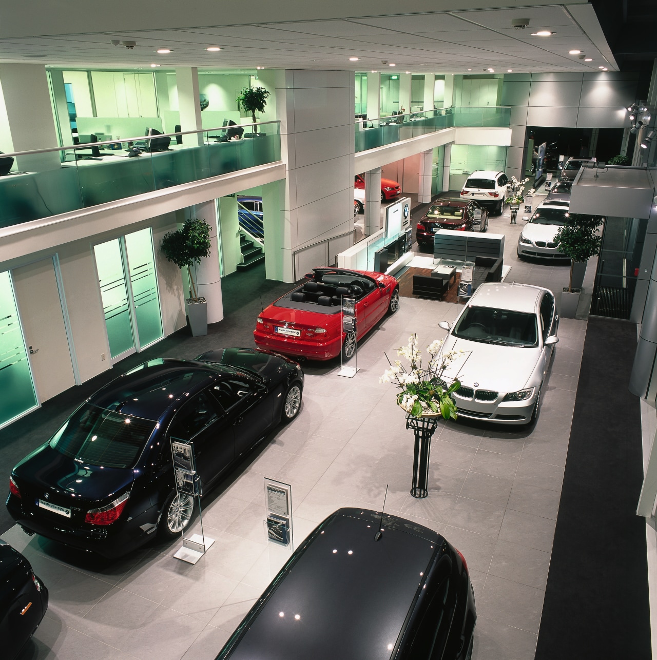 View of BMW showroom with offices on mezzanine auto show, automotive design, automotive exterior, car, car dealership, executive car, land vehicle, luxury vehicle, motor vehicle, personal luxury car, vehicle, gray, black