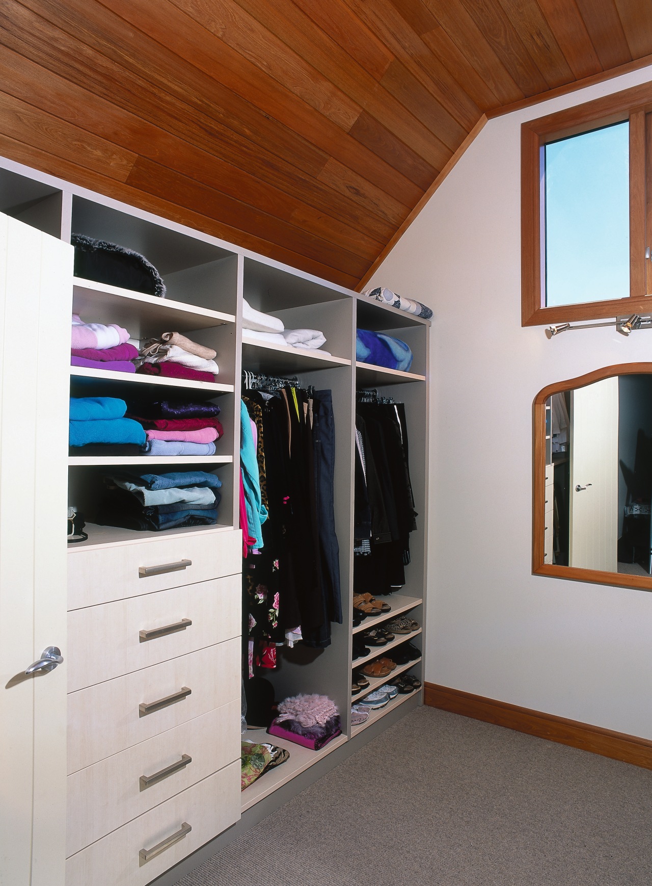 Dressing room with wardrobe storage system. closet, furniture, room, wardrobe, gray, brown