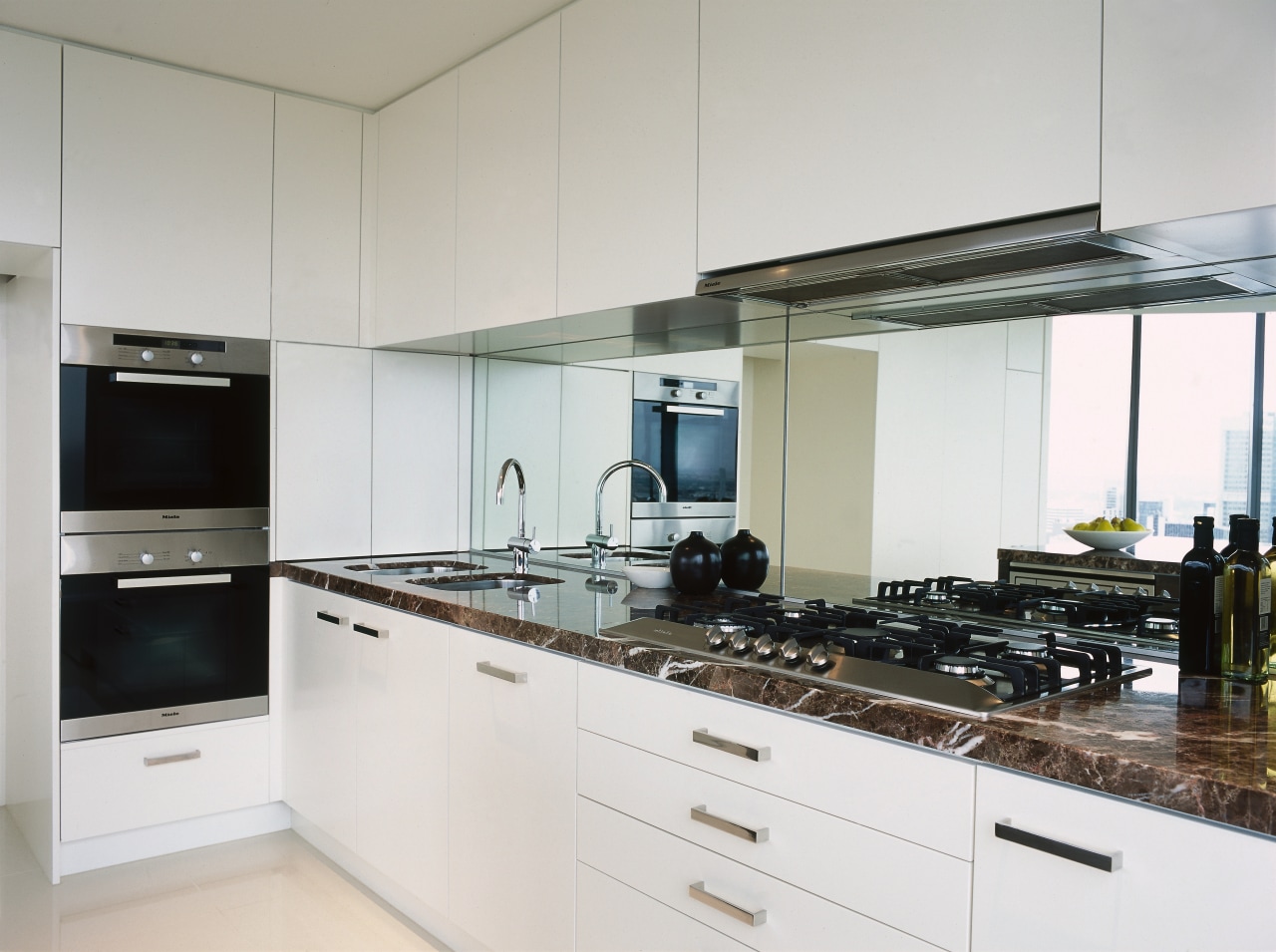 A view of some appliances by Miele. cabinetry, countertop, cuisine classique, interior design, kitchen, white