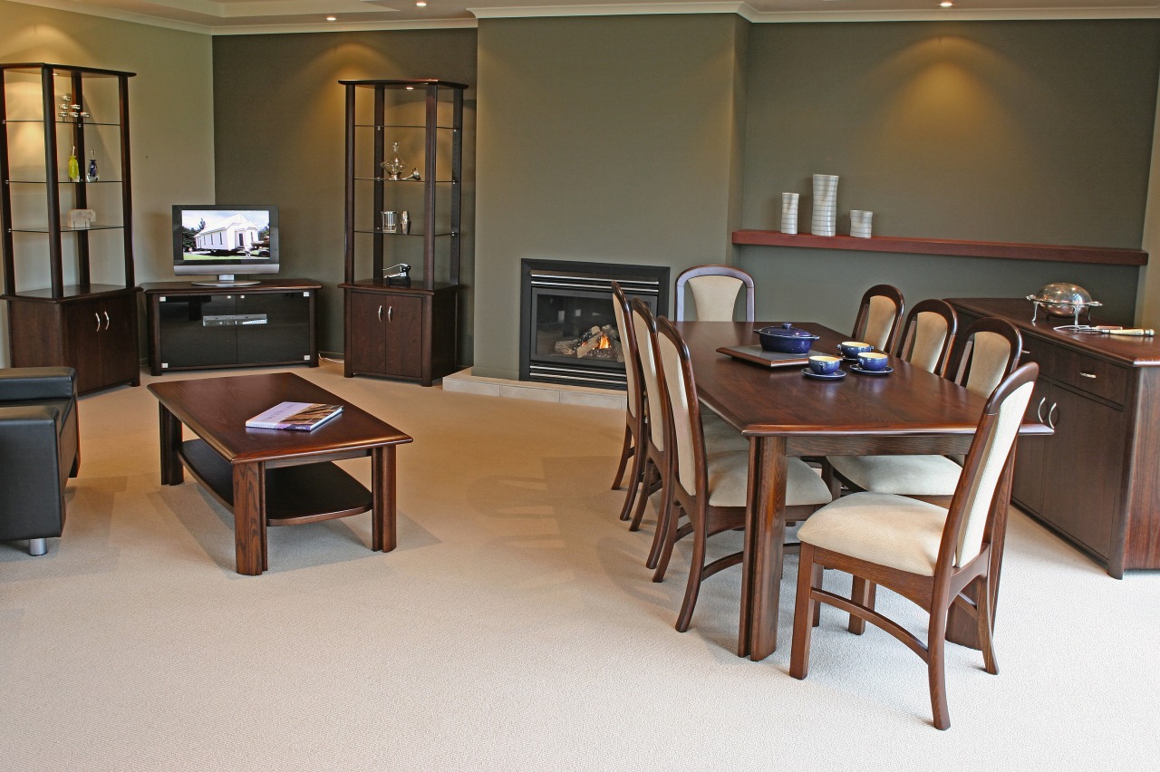 Open plan dining and lounge room with timber chair, floor, flooring, furniture, interior design, room, table, brown, gray