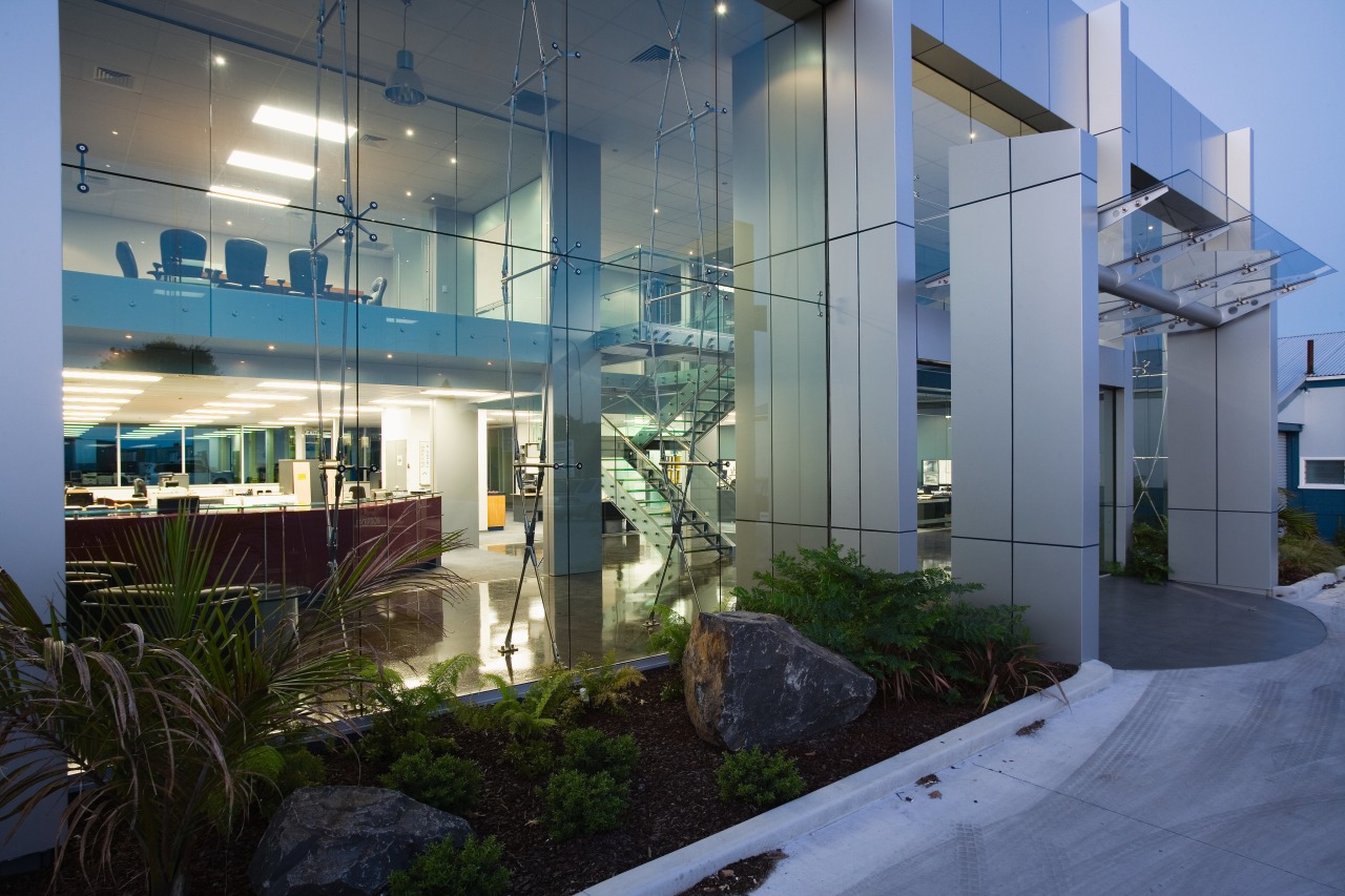 Exterior of commercial building showing extensive glazing along apartment, architecture, building, condominium, home, house, interior design, real estate, gray