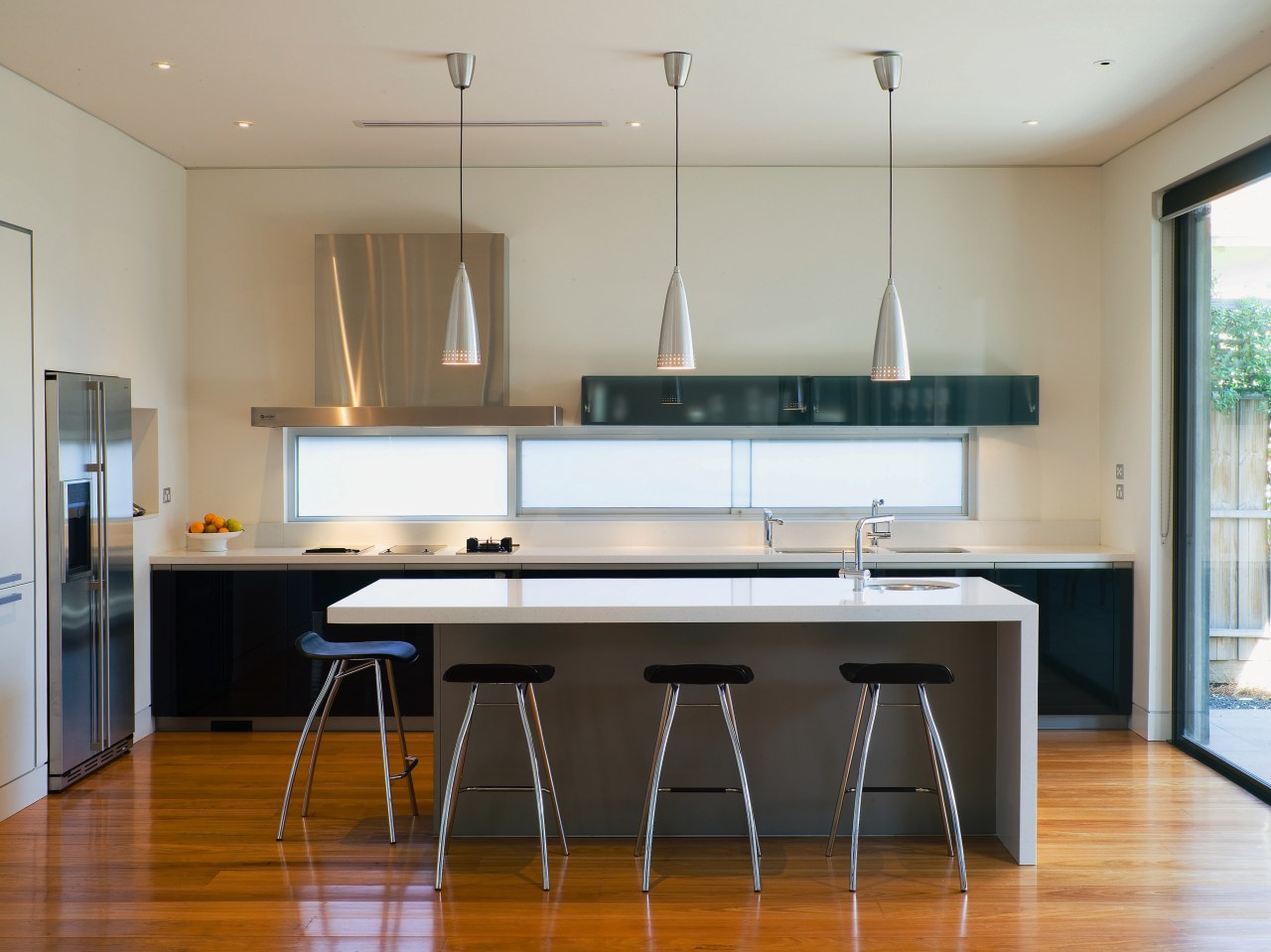 A view of the kitchen, wooden flooring and countertop, floor, furniture, interior design, kitchen, real estate, room, table, gray