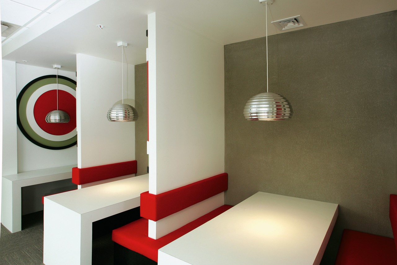 Mini breakout areas in office with graphic bulls-eye ceiling, floor, interior design, light fixture, lighting, product design, room, table, brown, gray