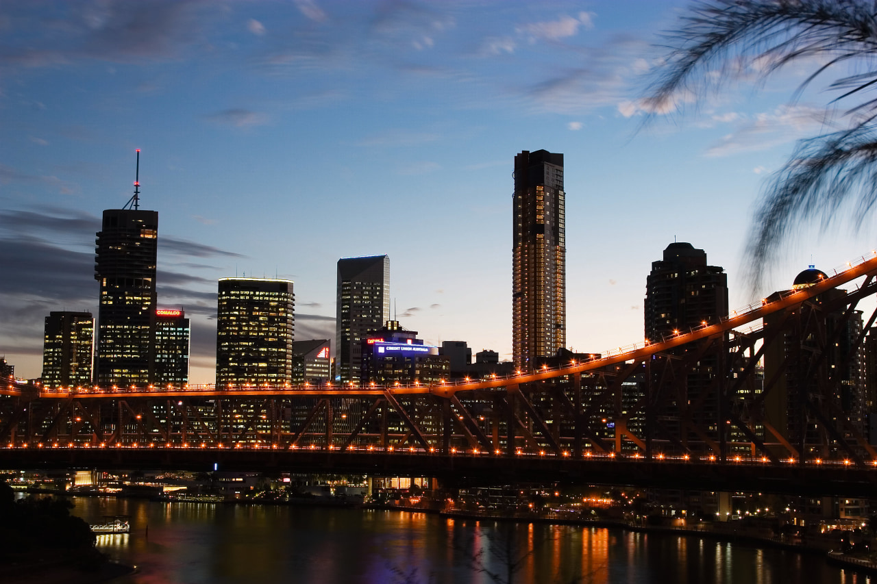 View of Aurora apartment on skyline with harbour bridge, building, city, cityscape, dawn, daytime, downtown, dusk, evening, horizon, landmark, metropolis, metropolitan area, night, reflection, river, sky, skyline, skyscraper, sunset, tower, tower block, urban area, water, black