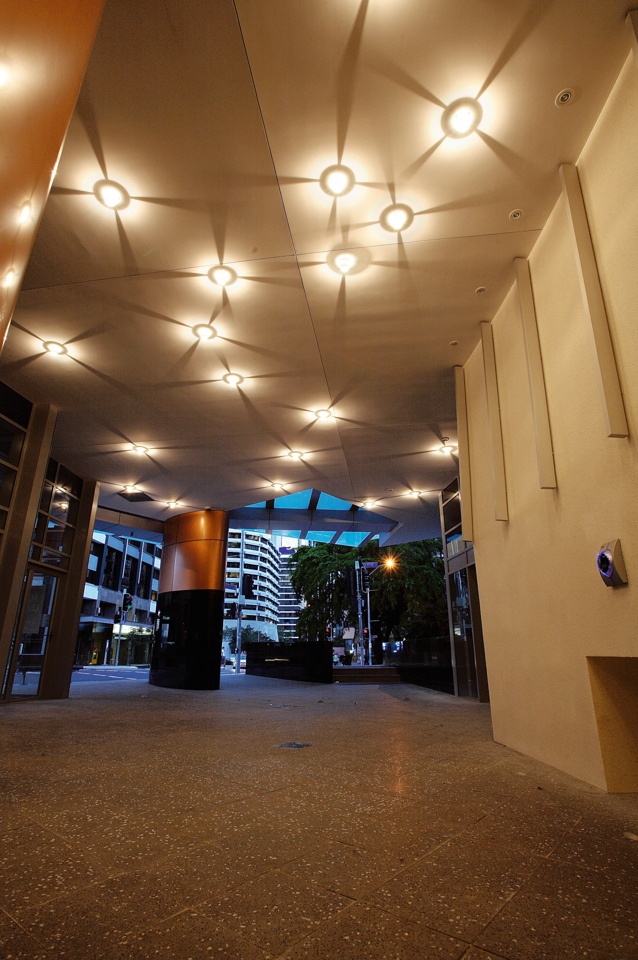 Lobby providing grand entrance to apartment building, and architecture, ceiling, daylighting, interior design, light, lighting, lobby, brown