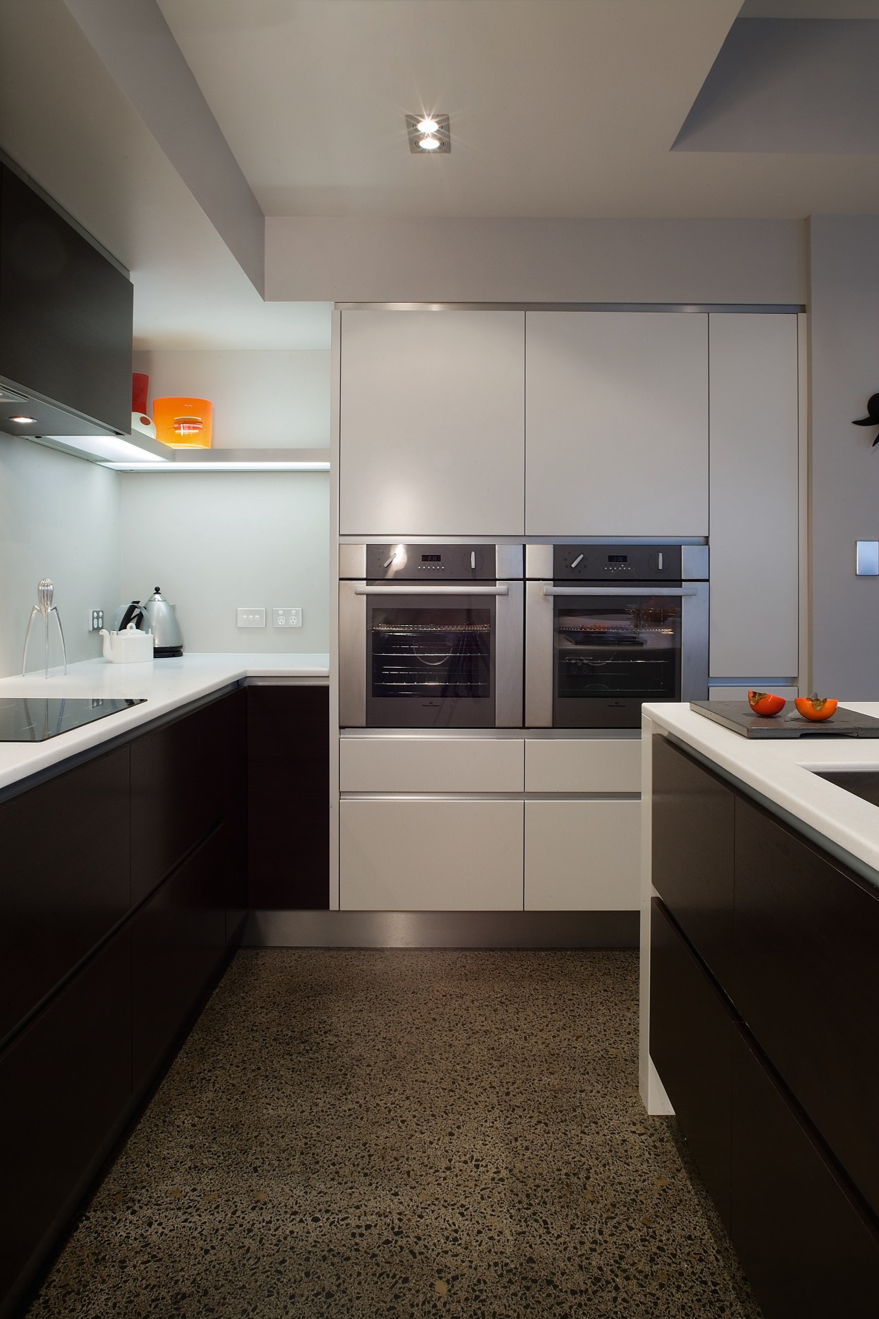 view of the kitchen featuring a seperate scullery, cabinetry, countertop, home appliance, interior design, kitchen, major appliance, room, gray, black