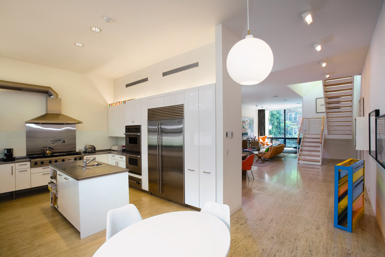 view of this kitchen featuring travertie flooring, apartment, architecture, house, interior design, kitchen, real estate, room, gray