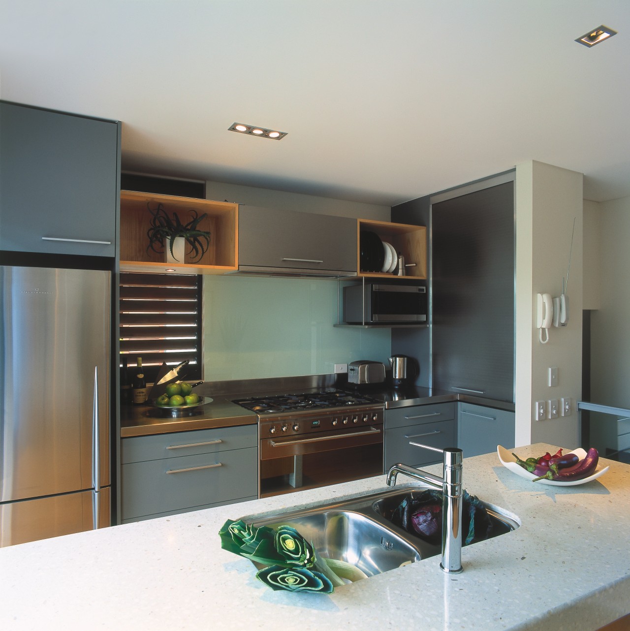A view of a kitchen with Haier Appliances cabinetry, countertop, home appliance, interior design, kitchen, room, gray