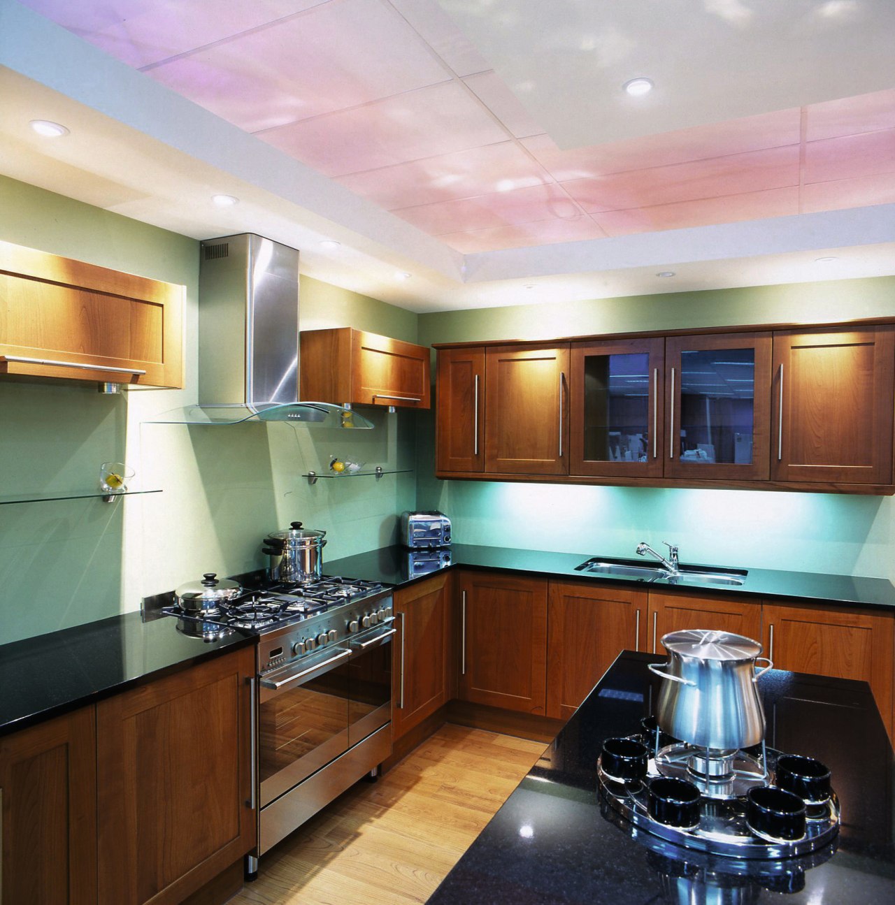 A view of a kitchen by Harvey Normans. cabinetry, ceiling, countertop, interior design, kitchen, real estate, room, gray