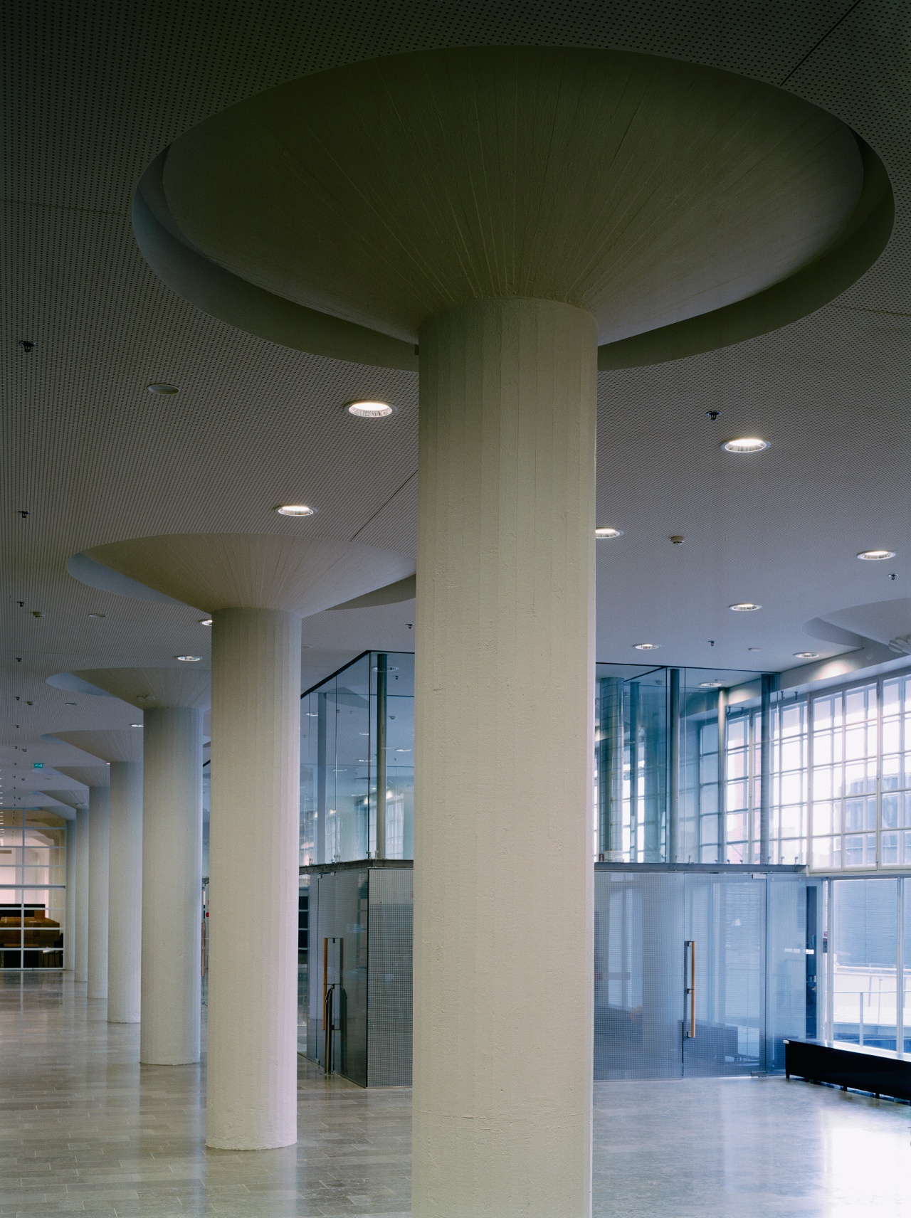 A view of the lobby area. architecture, ceiling, column, daylighting, daytime, glass, interior design, lobby, structure, tourist attraction, gray