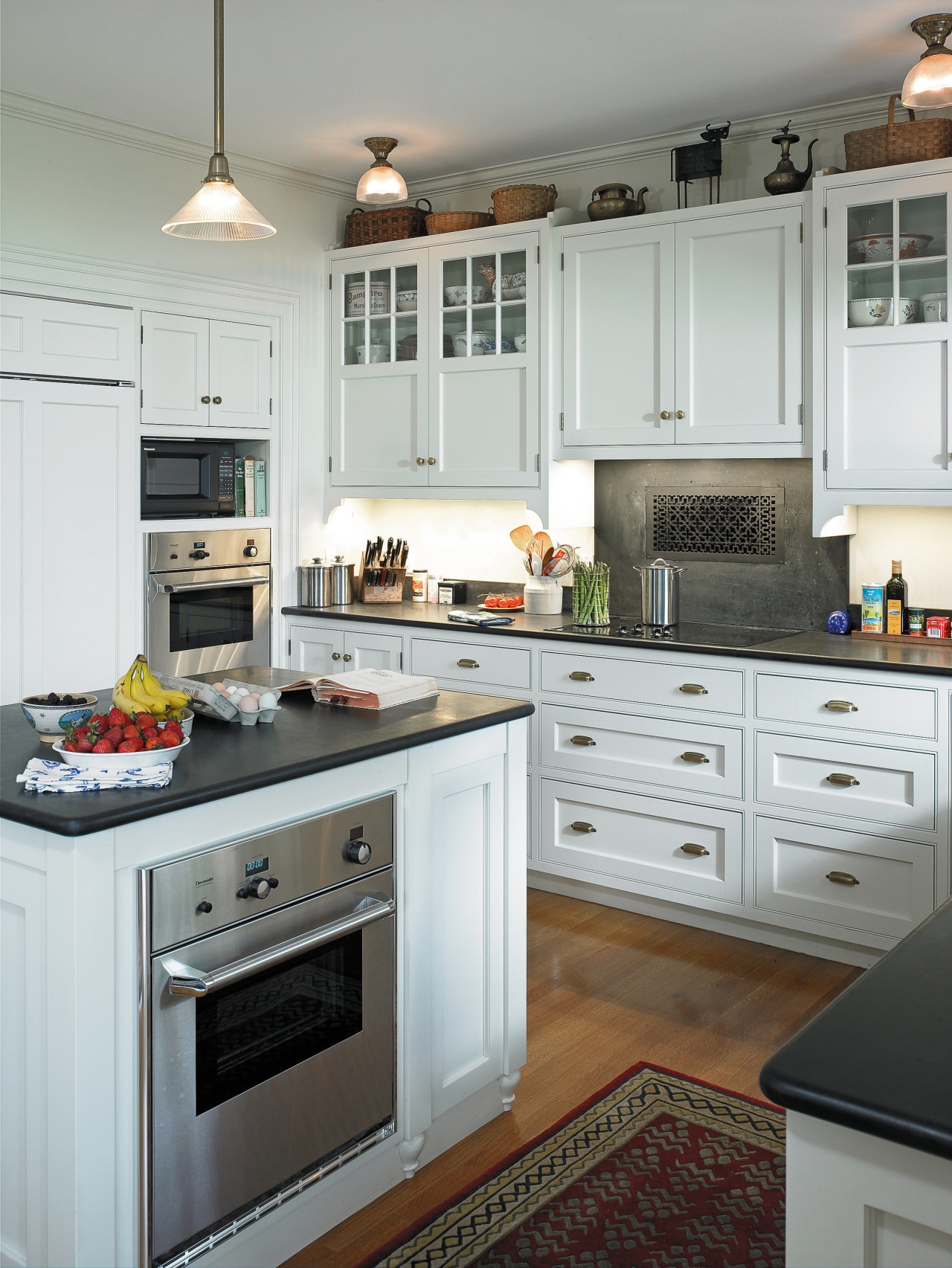 A view of the kitchen, wooden flooring and cabinetry, countertop, cuisine classique, floor, flooring, hardwood, home, home appliance, interior design, kitchen, kitchen appliance, kitchen stove, room, white, gray