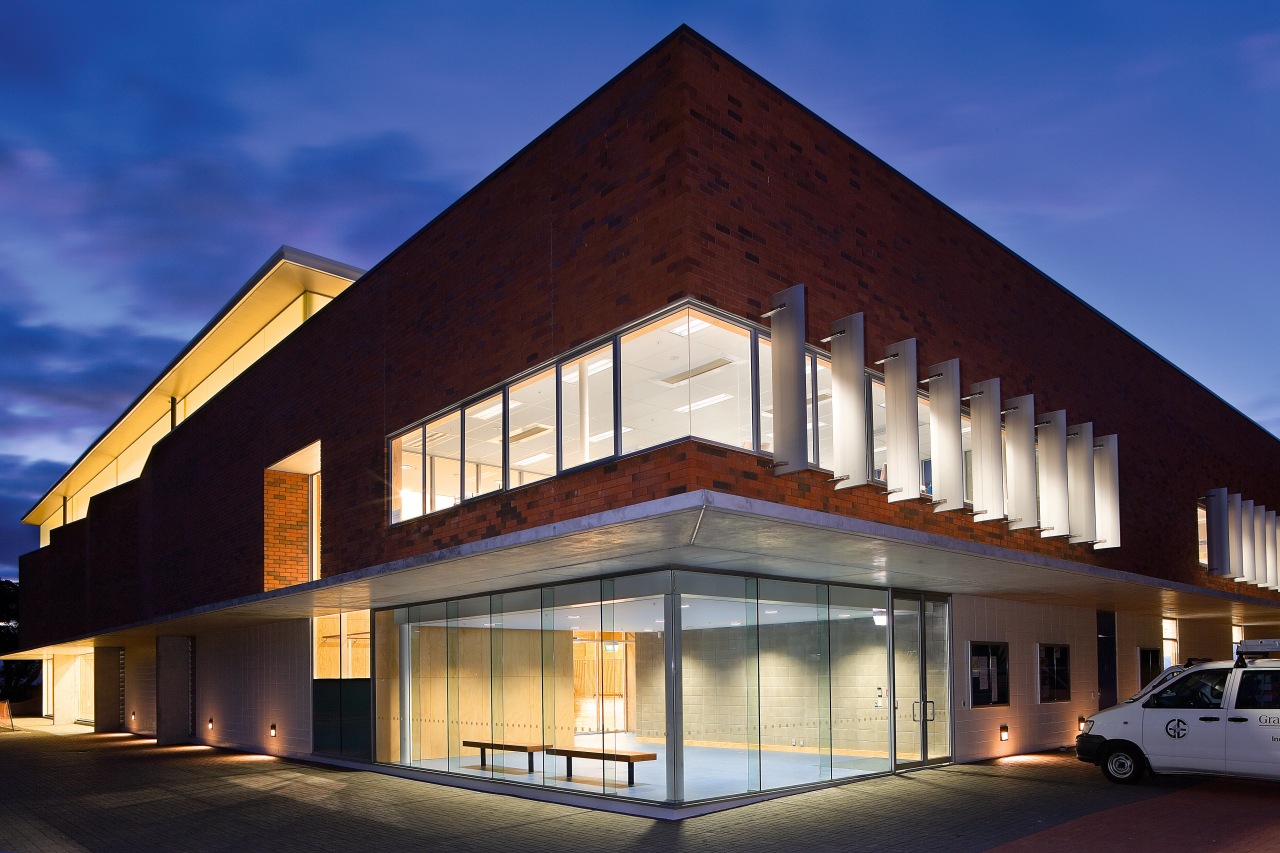 A view of the Auckland Grammar Sports Centre. architecture, building, commercial building, corporate headquarters, elevation, facade, home, house, mixed use, real estate, residential area, sky, window, blue