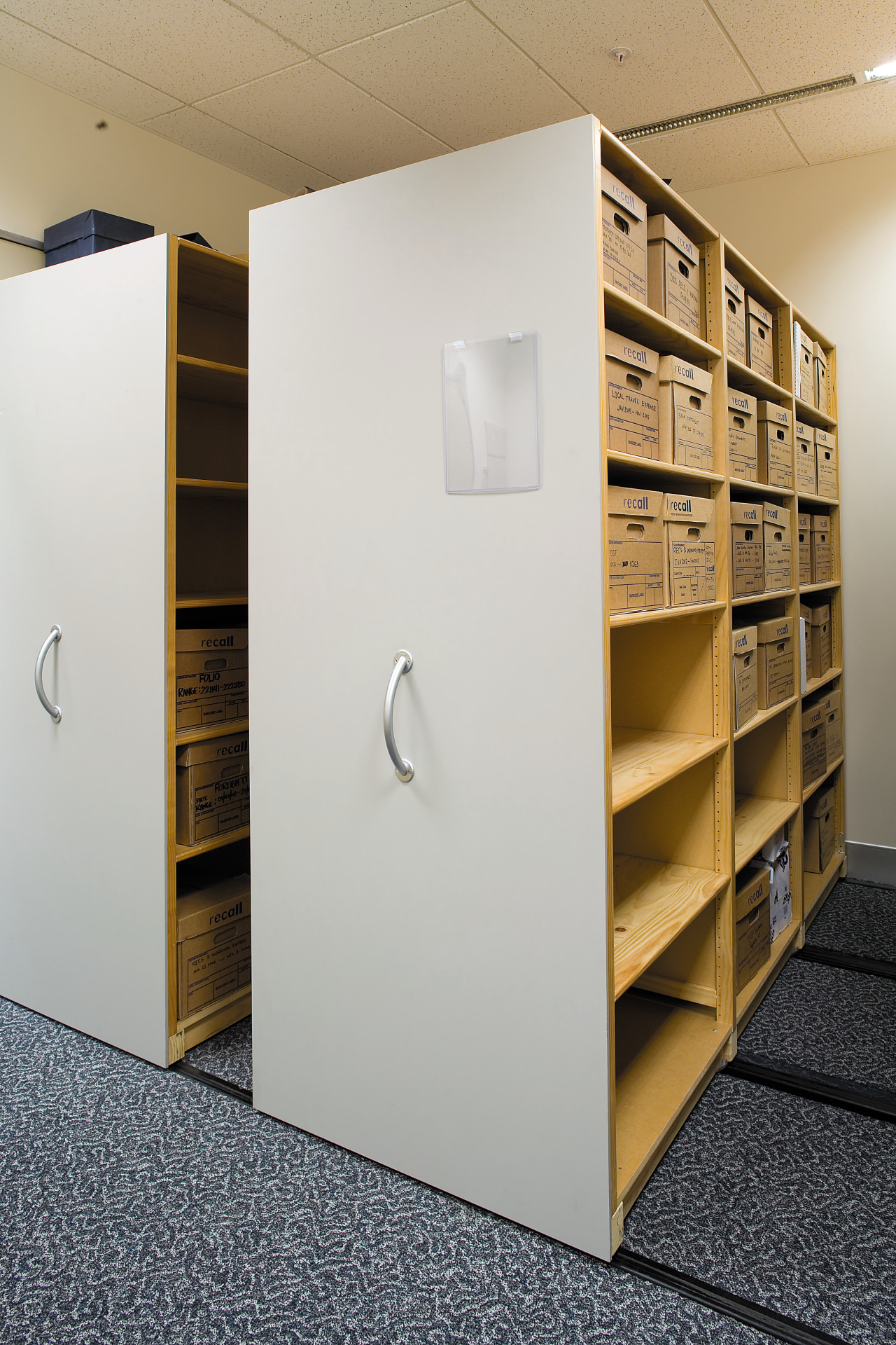 A view of some shelving. cabinetry, furniture, product design, shelf, shelving, gray