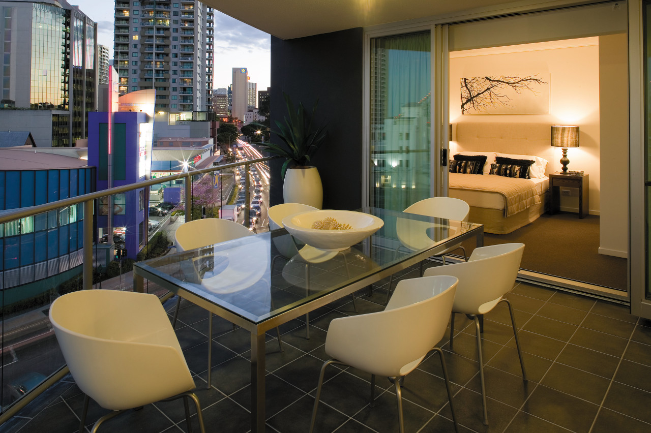 view of the exterior balcony of the HUB apartment, interior design, living room, real estate, room, table, brown