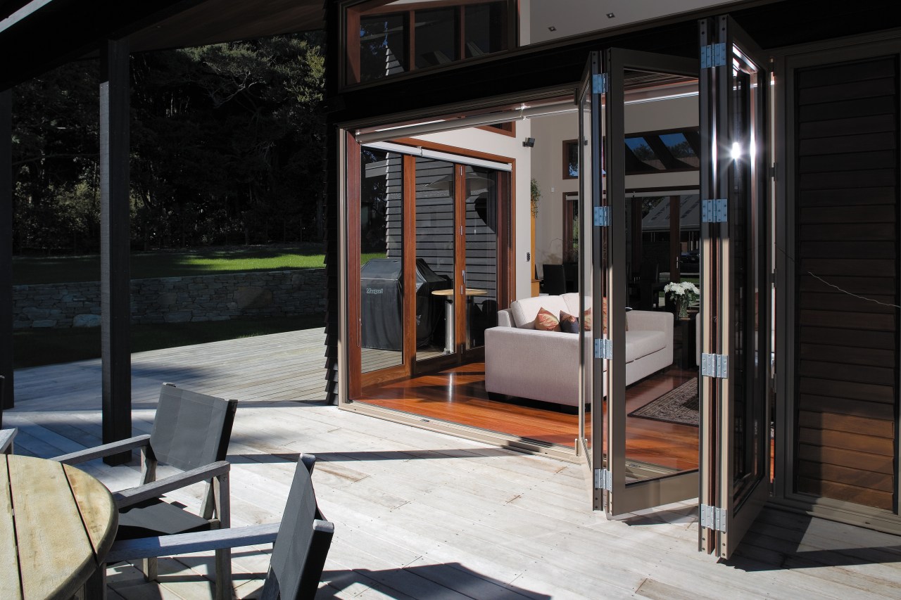 View of decking with bifold aluminium doors leading door, house, window, black