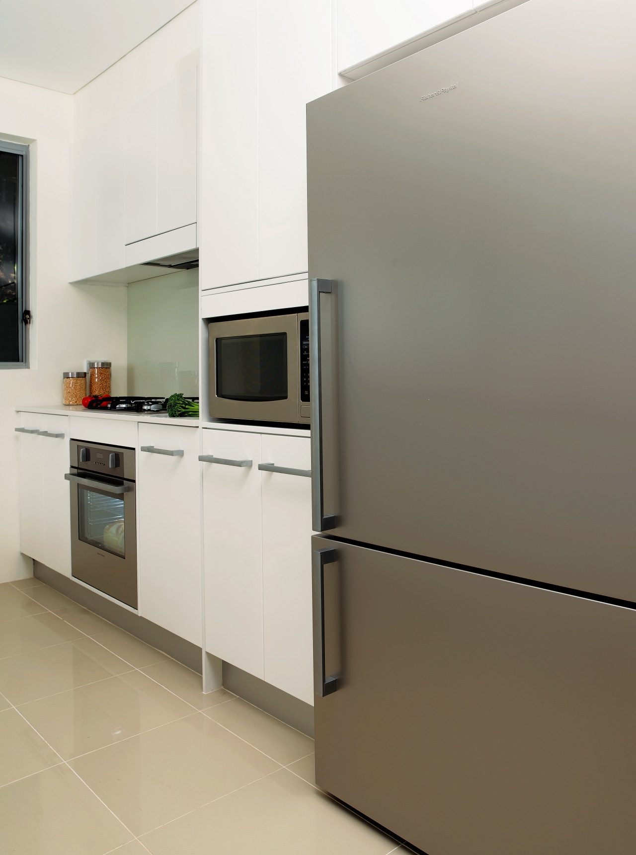 View of this Mondail Apartment featuring Fisher &amp; countertop, home appliance, interior design, kitchen, kitchen appliance, kitchen stove, major appliance, product design, white, gray