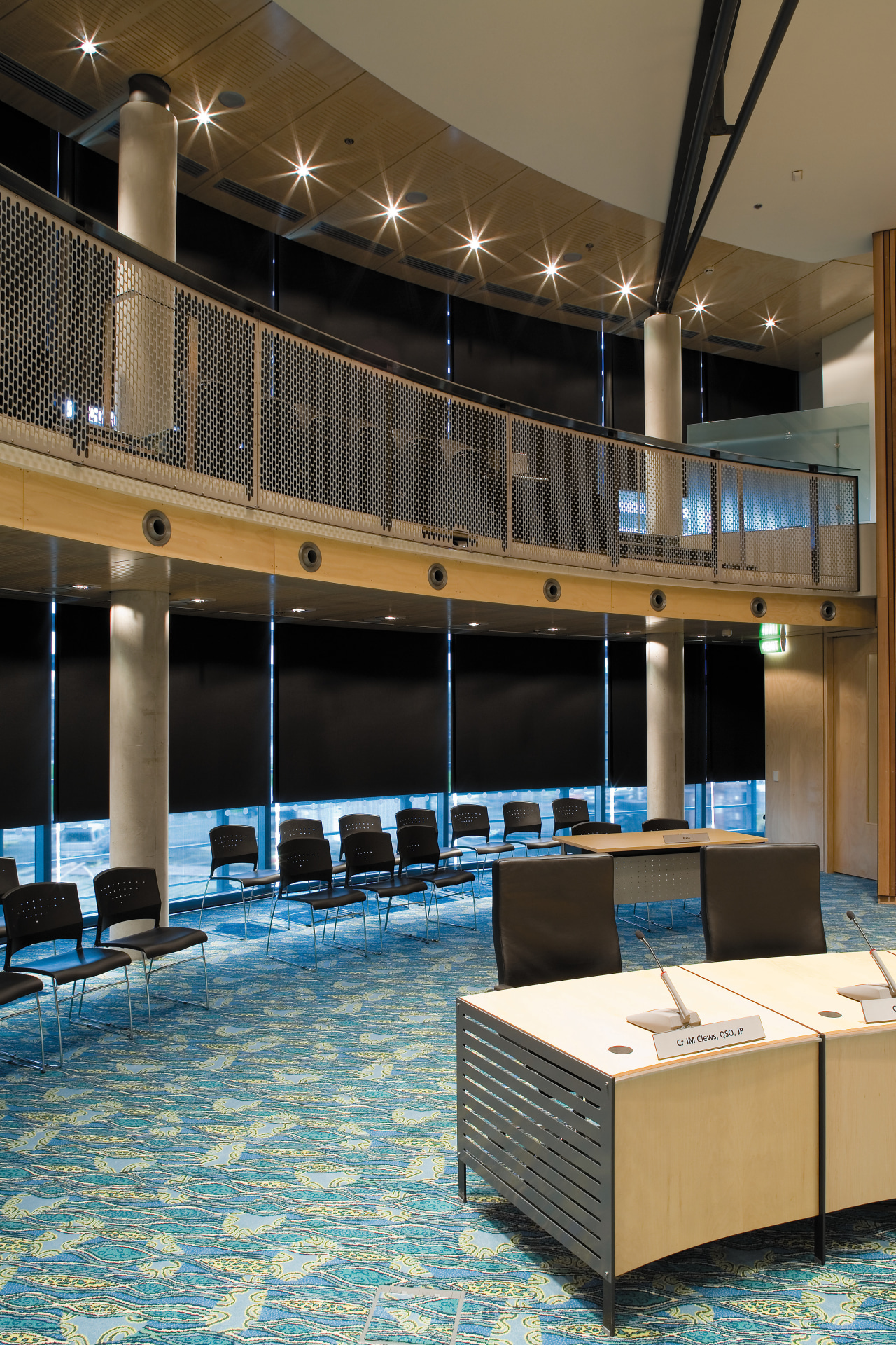 A view of some window shades. interior design, lobby, black