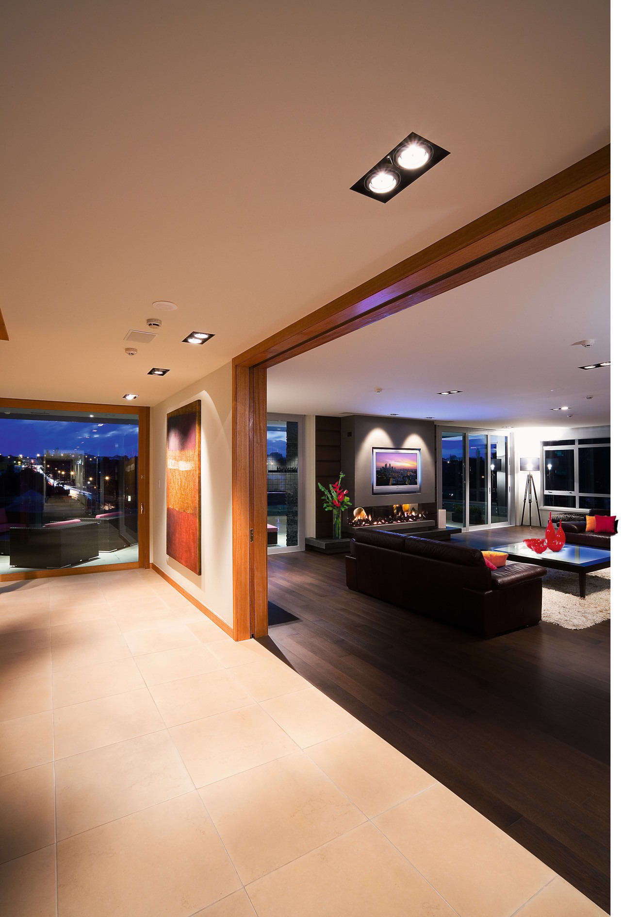 High end apartment.  Inner-city apartments. ceiling, floor, flooring, interior design, lighting, lobby, brown, orange