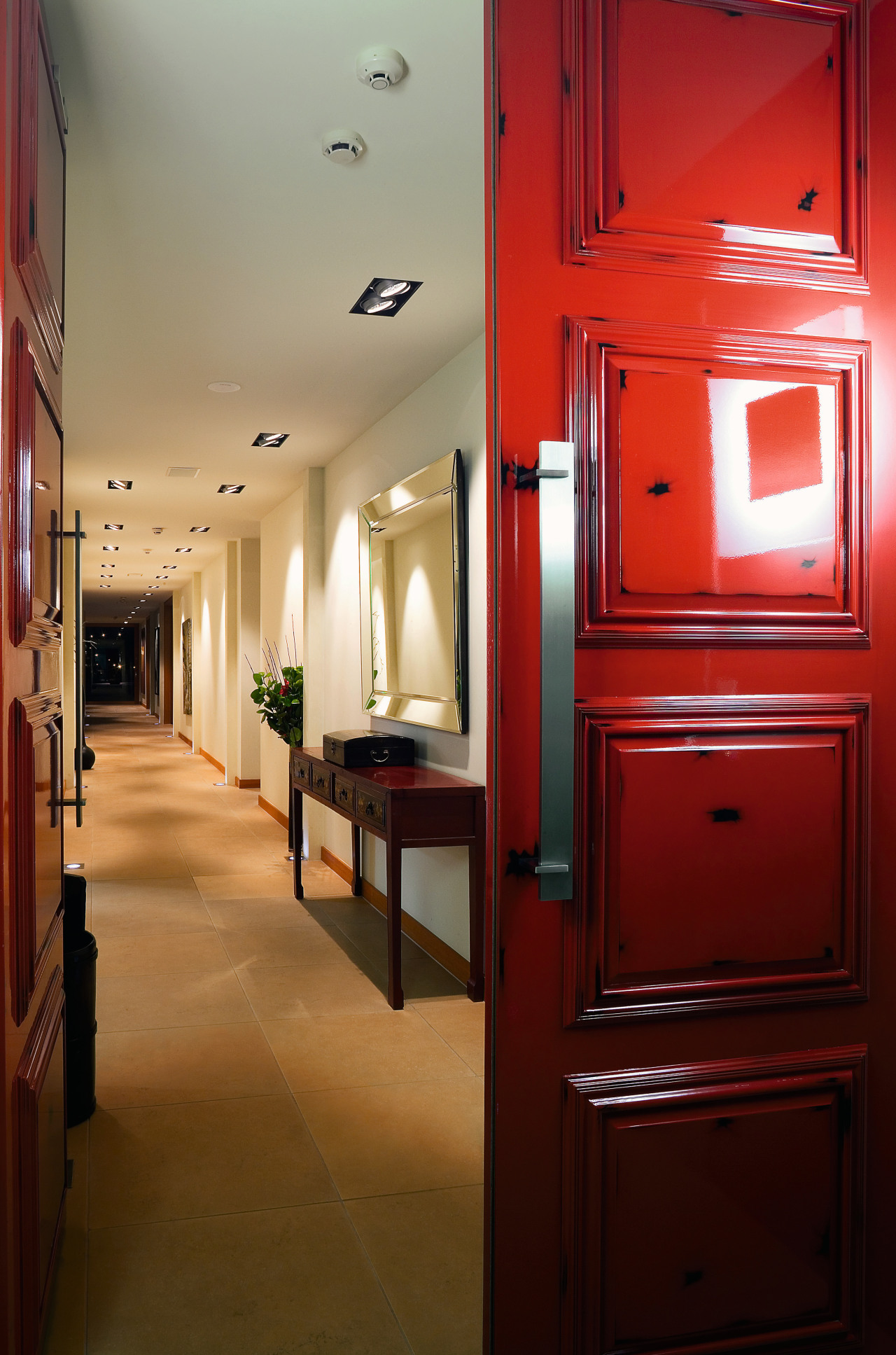 The Loui Corporation works in partnership with paint door, furniture, interior design, lighting, room, red