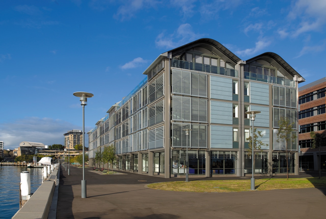 view of the saunders wharf apartment s that apartment, architecture, building, city, commercial building, condominium, corporate headquarters, facade, headquarters, house, mixed use, neighbourhood, real estate, residential area, sky, teal