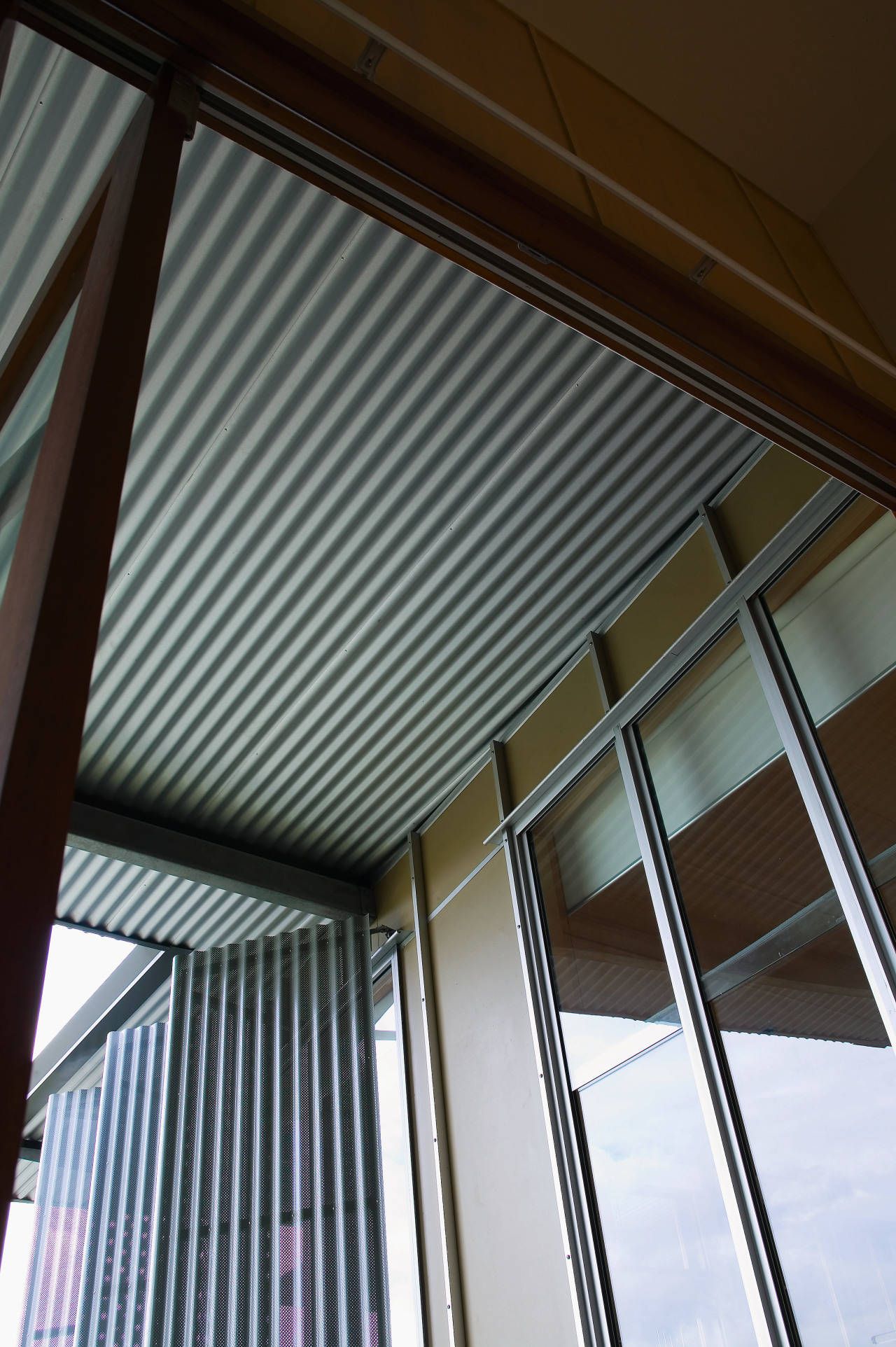 view of the  Zincalume underside finish,  architecture, beam, ceiling, daylighting, facade, glass, house, line, roof, shade, siding, structure, window, window covering, wood, black, gray