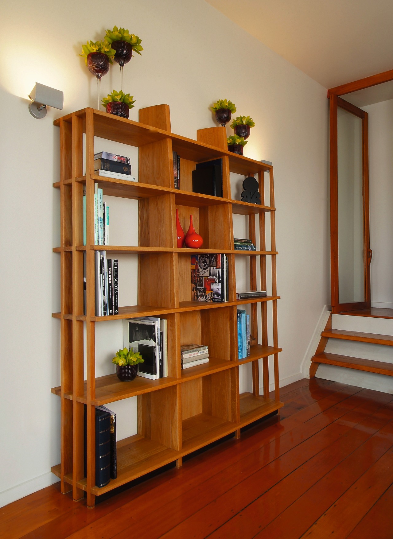 A view of some furniture from Glenn Buckley bookcase, cabinetry, furniture, hardwood, home, interior design, library, shelf, shelving, wood, brown, gray