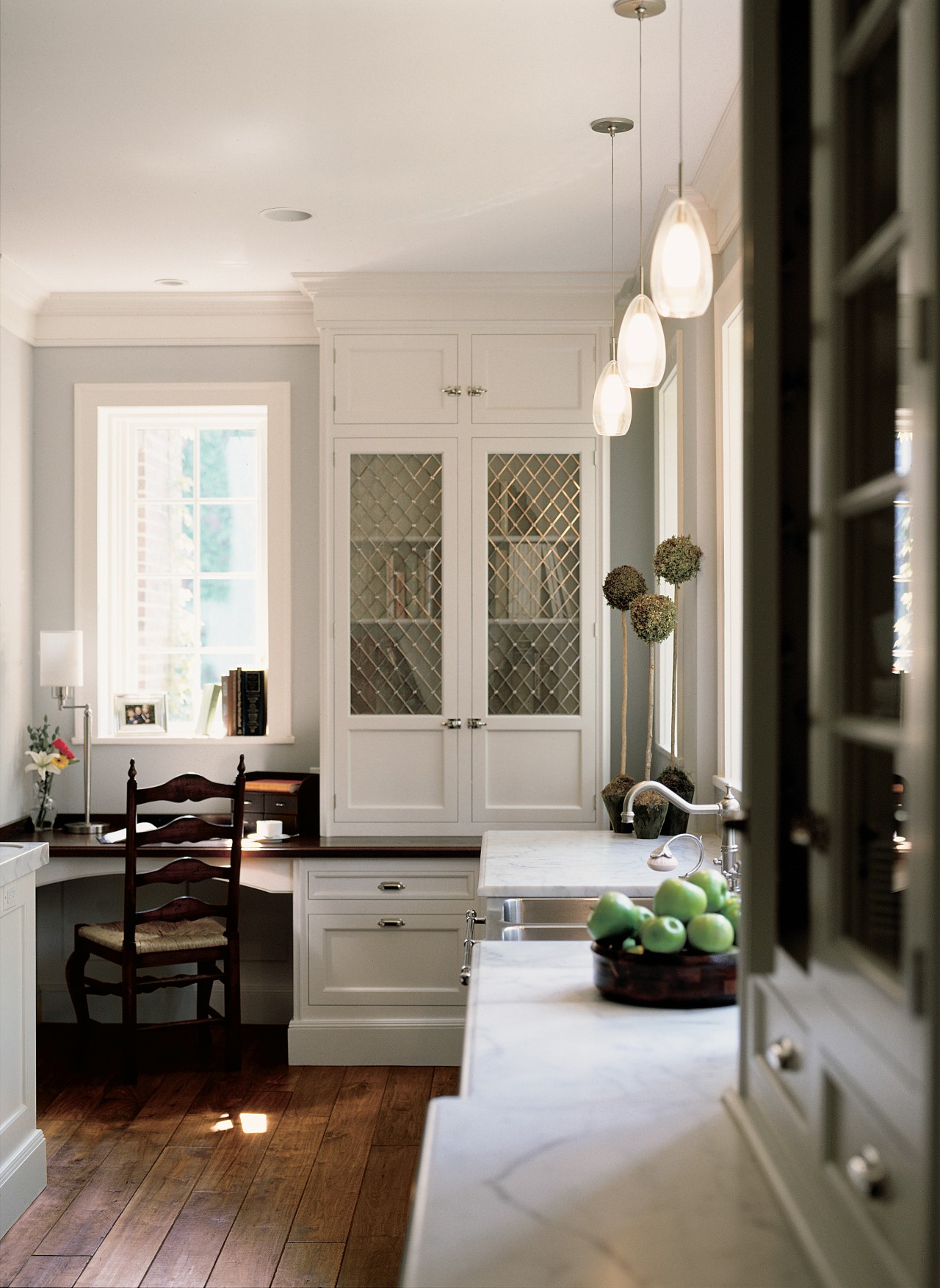 A view of some kitchen cabinetry by Christopher ceiling, floor, flooring, furniture, home, interior design, living room, room, window, gray