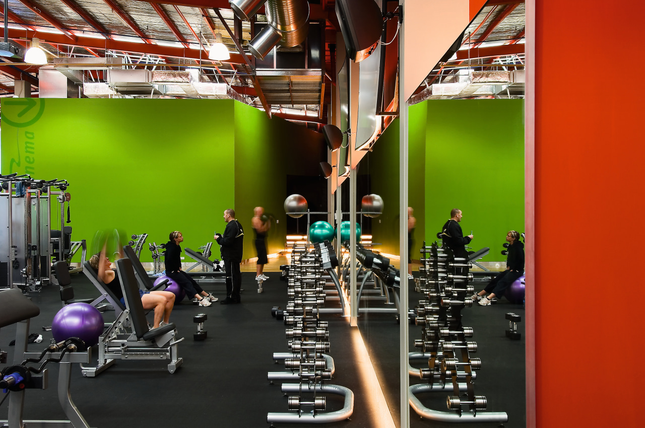 view of the les mills gym area featuring gym, room, sport venue, structure, black