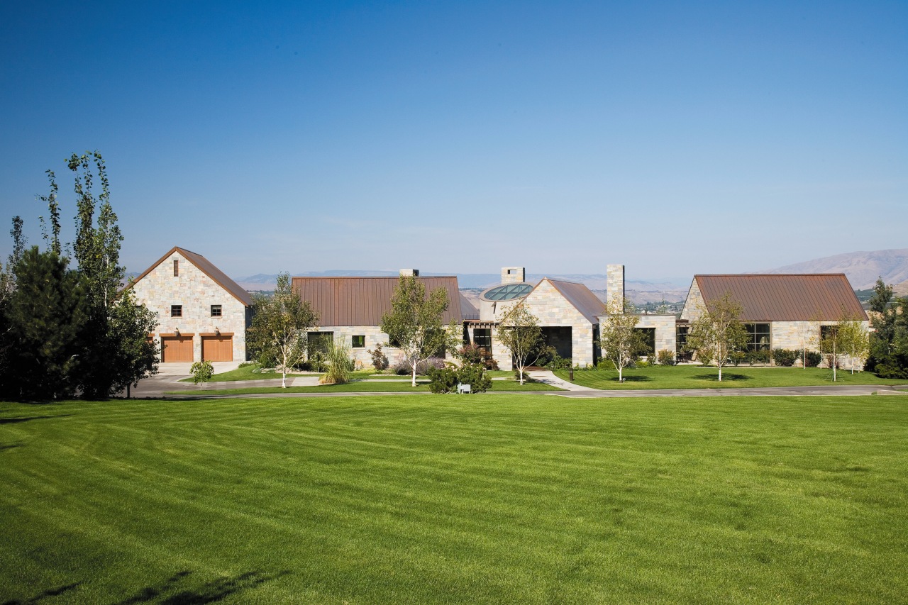 An exterior view of the entire home. campus, cottage, daytime, estate, facade, farm, farmhouse, field, grass, home, house, land lot, landscape, landscaping, lawn, mansion, meadow, neighbourhood, plant, property, real estate, residential area, roof, rural area, sky, suburb, tree, yard, teal