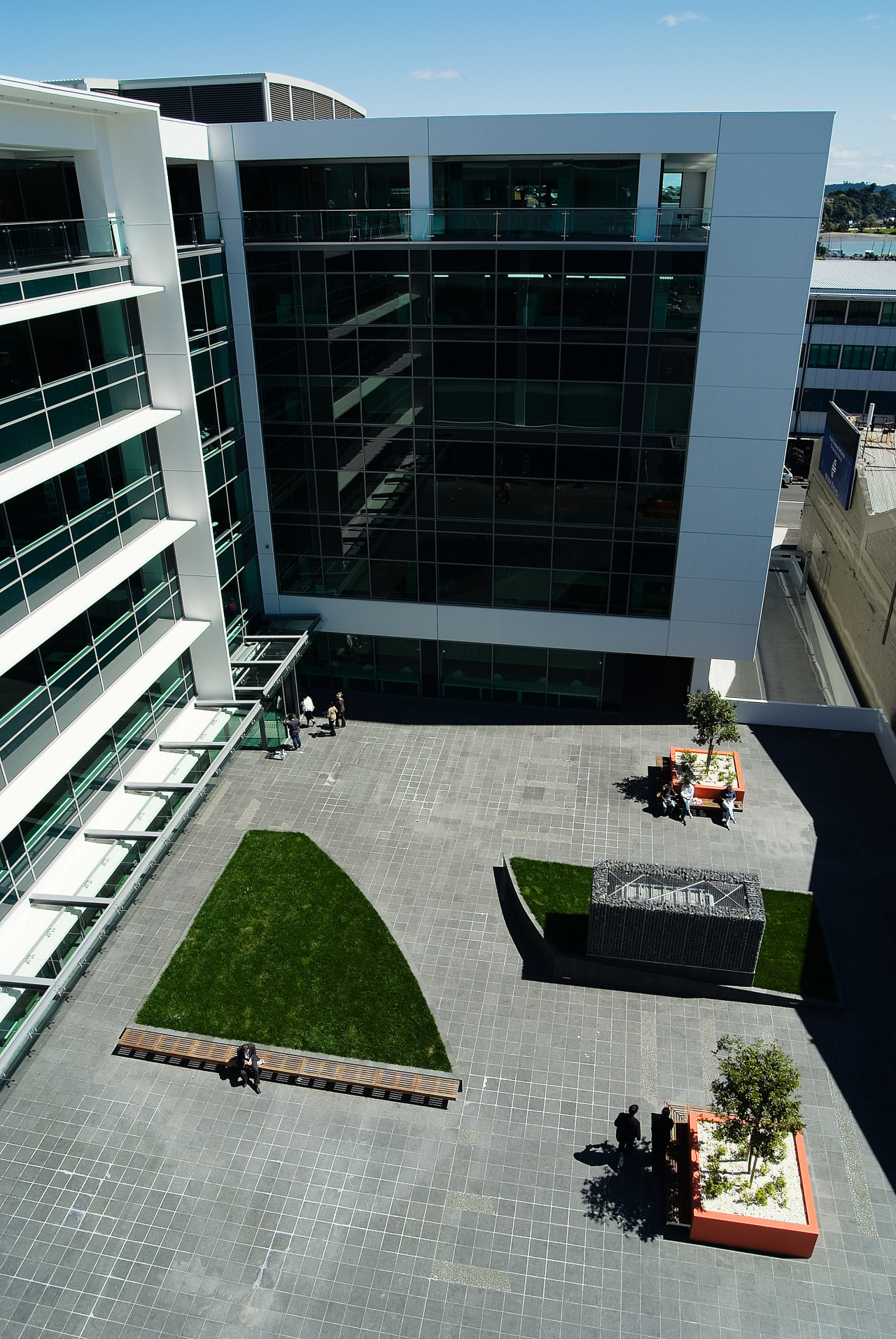 A view of some construction work done by architecture, building, city, condominium, corporate headquarters, mixed use, window, gray, black