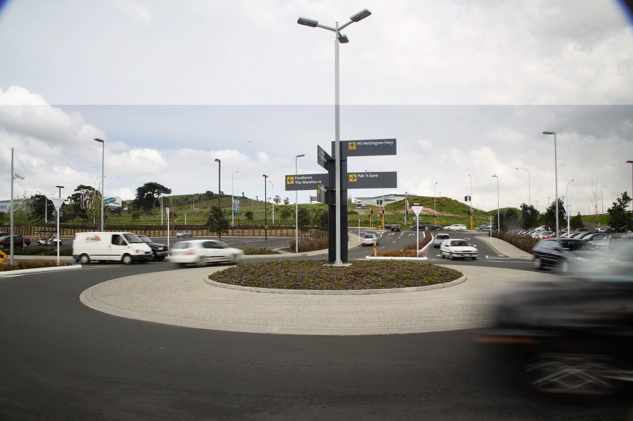 A view of the roading by Flow Transportation asphalt, car, parking lot, road, sky, street, street light, white, black