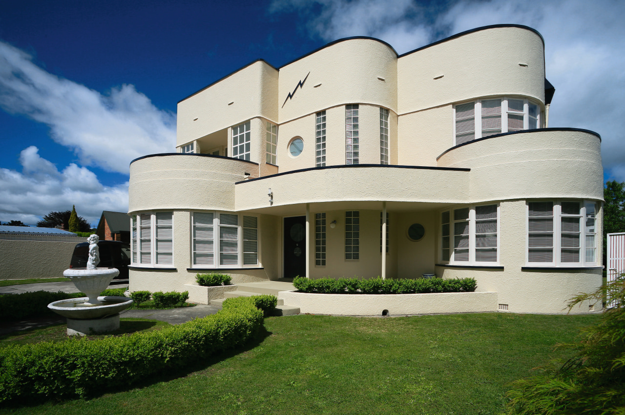 A view of some windows from Window Treatments apartment, architecture, building, corporate headquarters, daytime, elevation, estate, facade, home, house, mansion, property, real estate, residential area, sky, villa, window