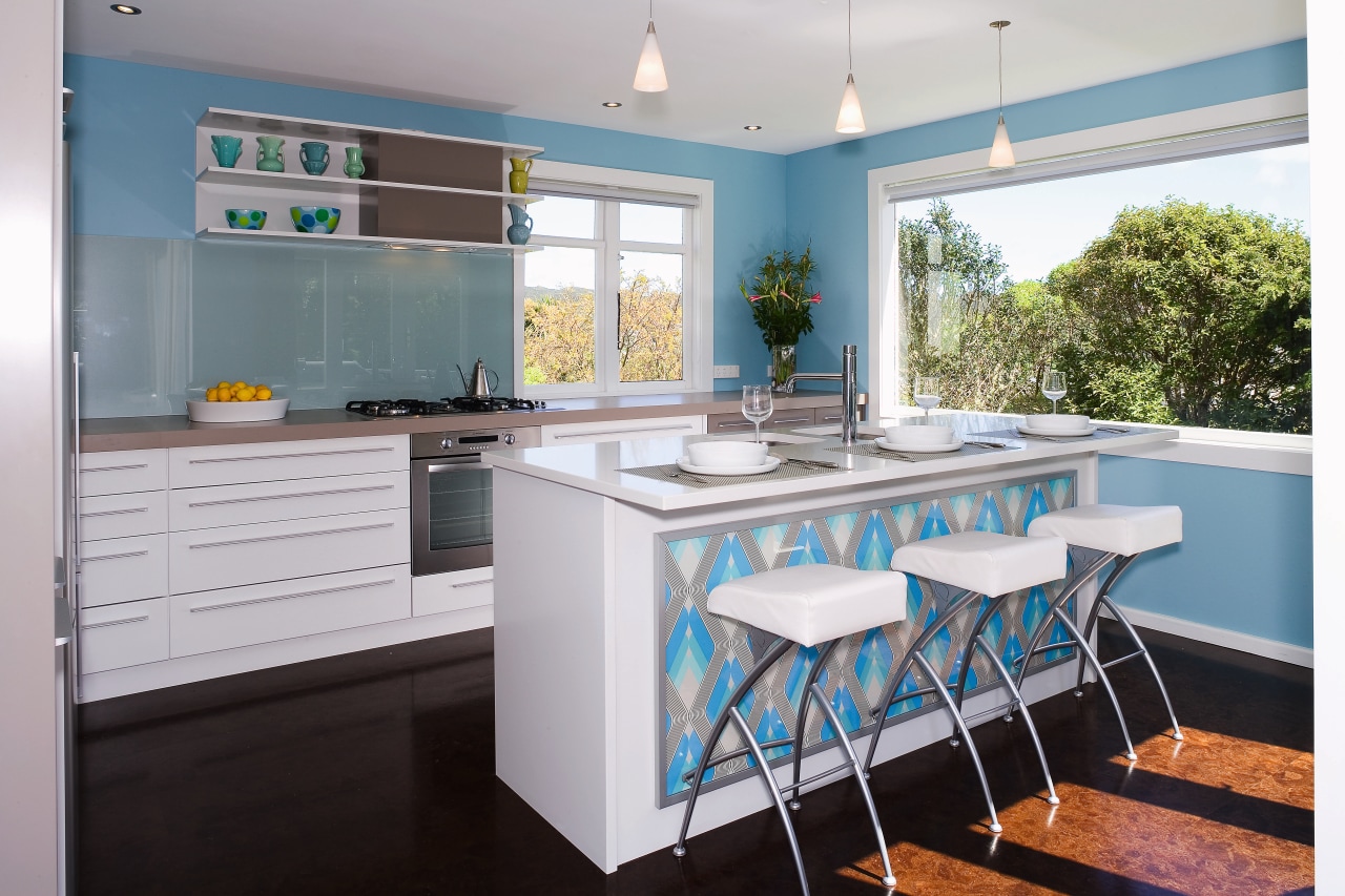 view of the kitchen featuring blum kitchen cabinetry, countertop, dining room, home, interior design, kitchen, real estate, room, gray, white