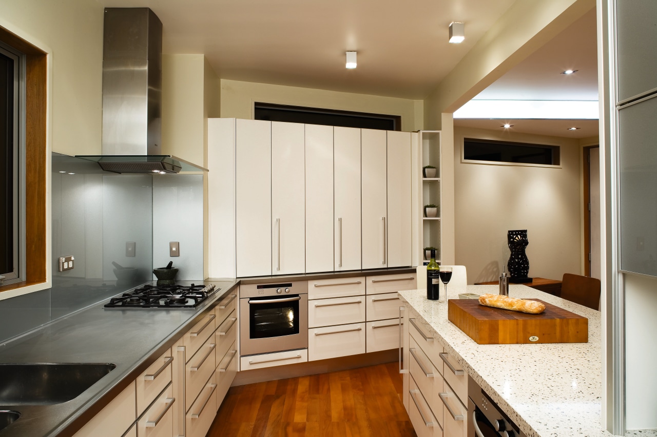 A view of the kitchen area, wooden flooring cabinetry, countertop, cuisine classique, interior design, kitchen, real estate, room, white, brown