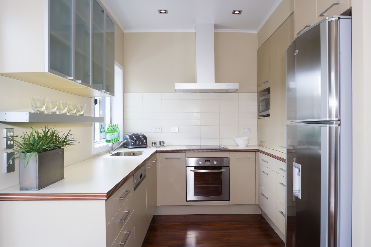 A view of a kitchen designed by YellowFox. cabinetry, countertop, cuisine classique, interior design, kitchen, property, real estate, room, gray, white