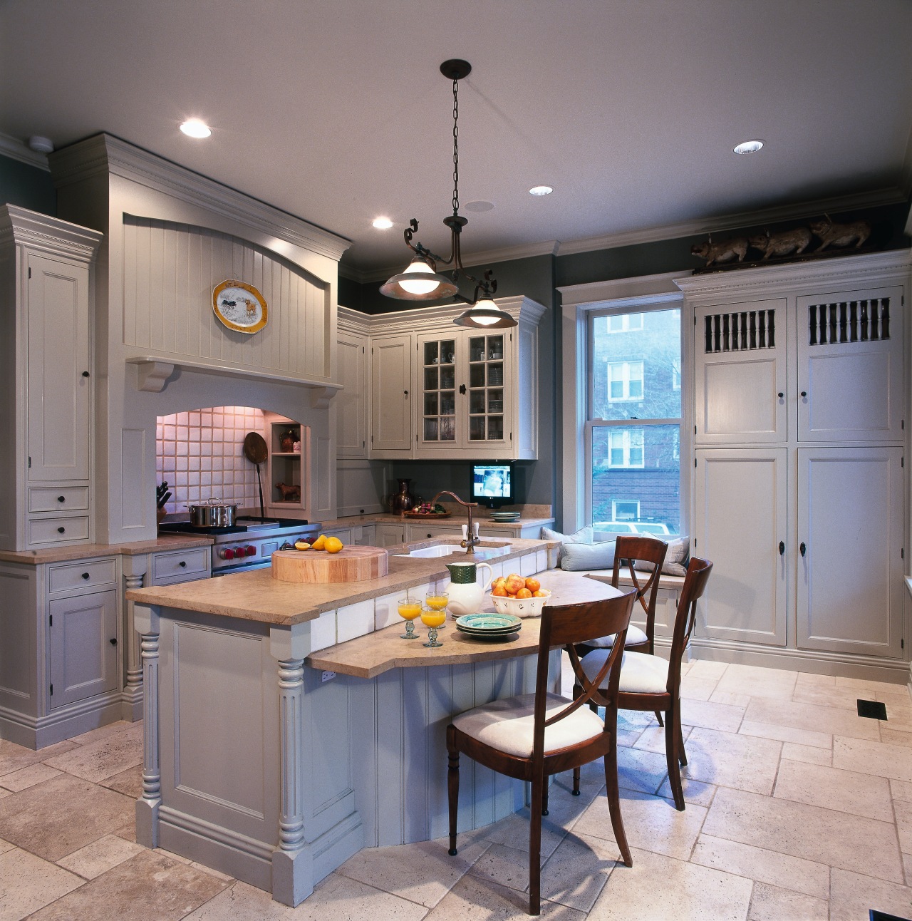 A view of this kitchen that features a cabinetry, countertop, cuisine classique, interior design, kitchen, room, gray