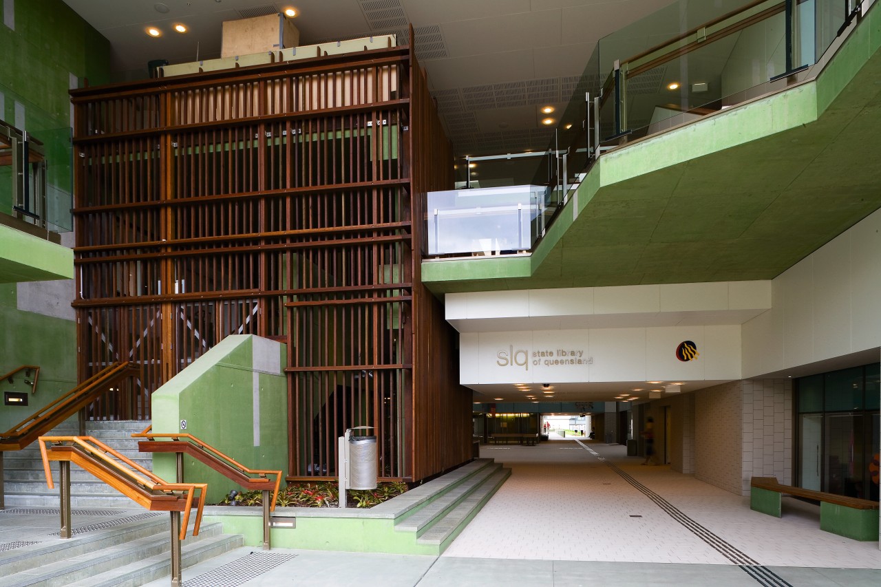 A view of some work done by Calty architecture, building, condominium, lobby, brown