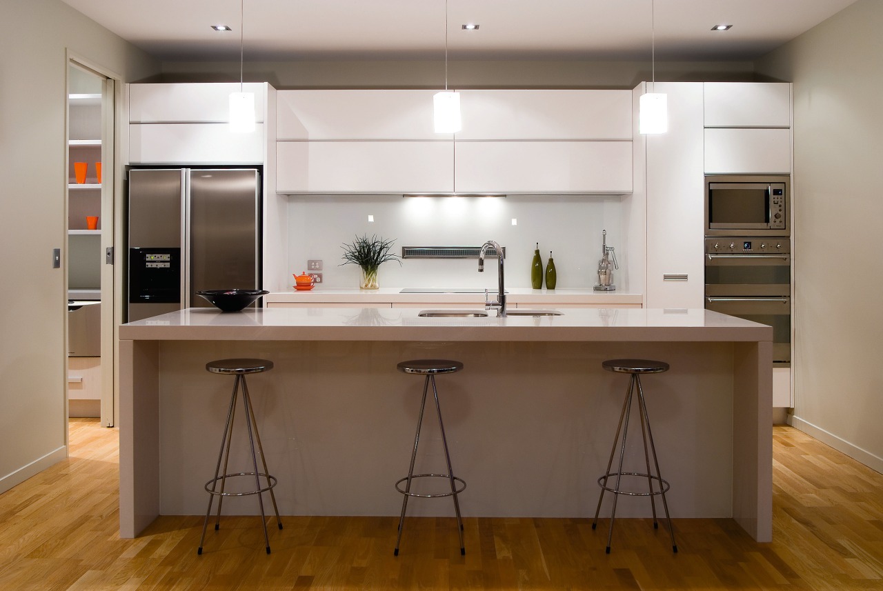 A view of a kitchen by Kitchens By cabinetry, countertop, cuisine classique, interior design, kitchen, room, wood flooring, brown, gray