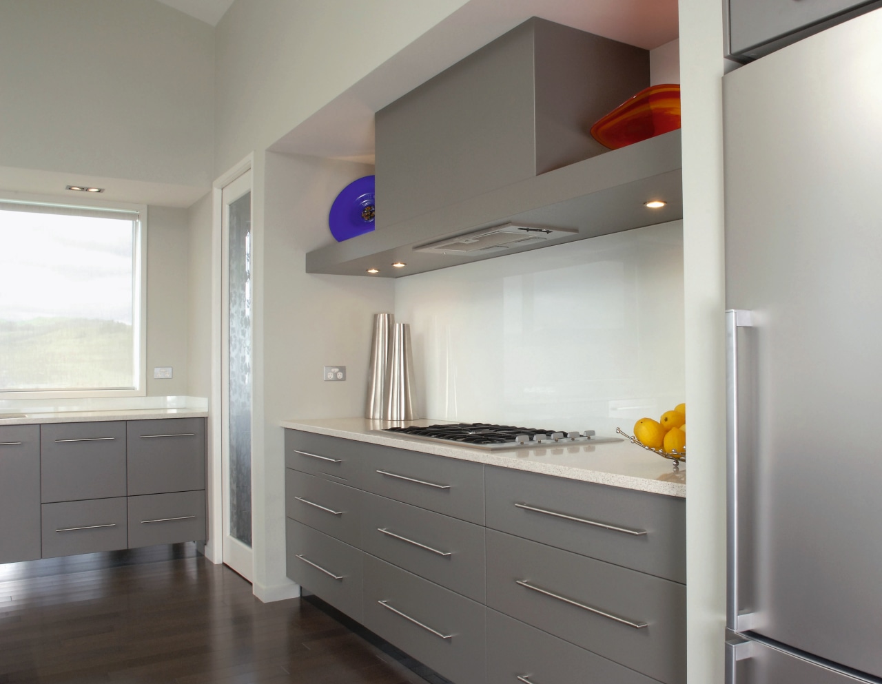 A view of a kitchen by Design House cabinetry, countertop, home appliance, interior design, kitchen, real estate, room, gray