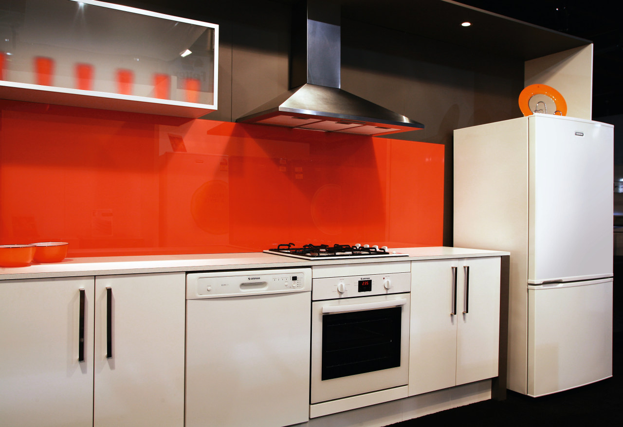 A view of some Simpson kitchen appliances. cabinetry, countertop, home appliance, interior design, kitchen, kitchen appliance, kitchen stove, major appliance, orange, product, product design, room, gray