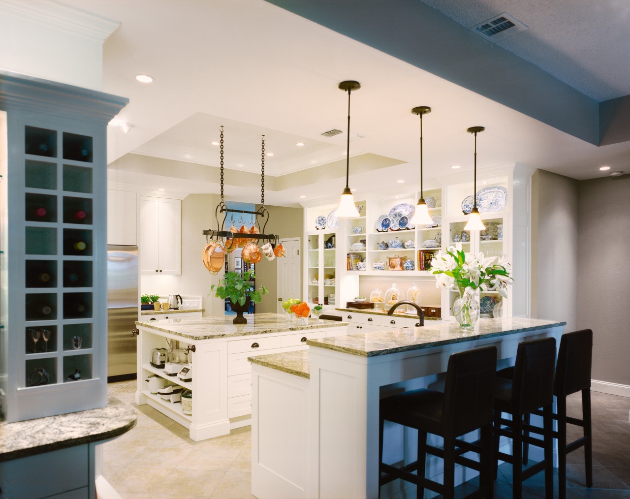 A view of the kitchen area, wooden cabinetry cabinetry, ceiling, countertop, cuisine classique, interior design, kitchen, room, white