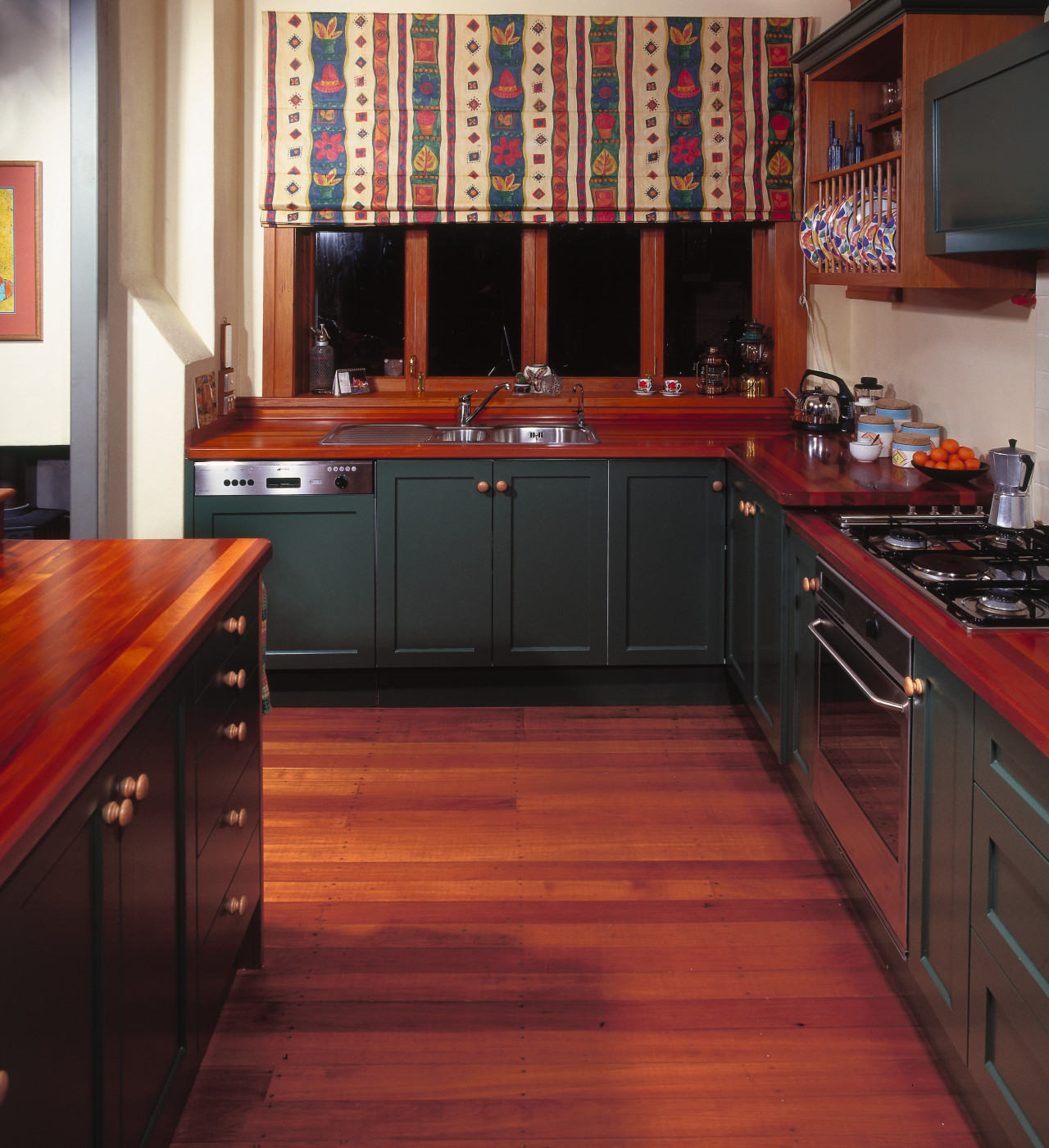 A view of some kitchen cabinetry by Kings cabinetry, countertop, cuisine classique, floor, flooring, furniture, hardwood, interior design, kitchen, room, wood, wood flooring, wood stain, red, black