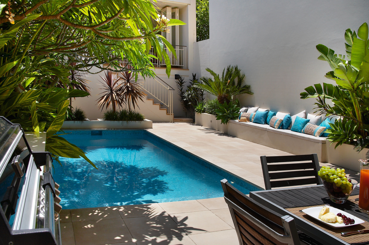 View of this Secluded pool surround by lush backyard, leisure, majorelle blue, plant, property, real estate, resort, swimming pool, tree, water, gray, brown