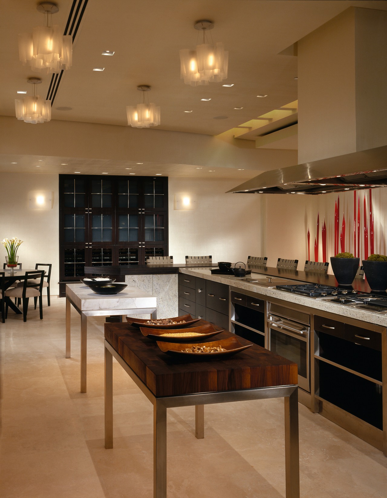 A view of this new de Giuilo kitchen cabinetry, ceiling, countertop, floor, flooring, hardwood, interior design, kitchen, lighting, room, under cabinet lighting, wood flooring, brown